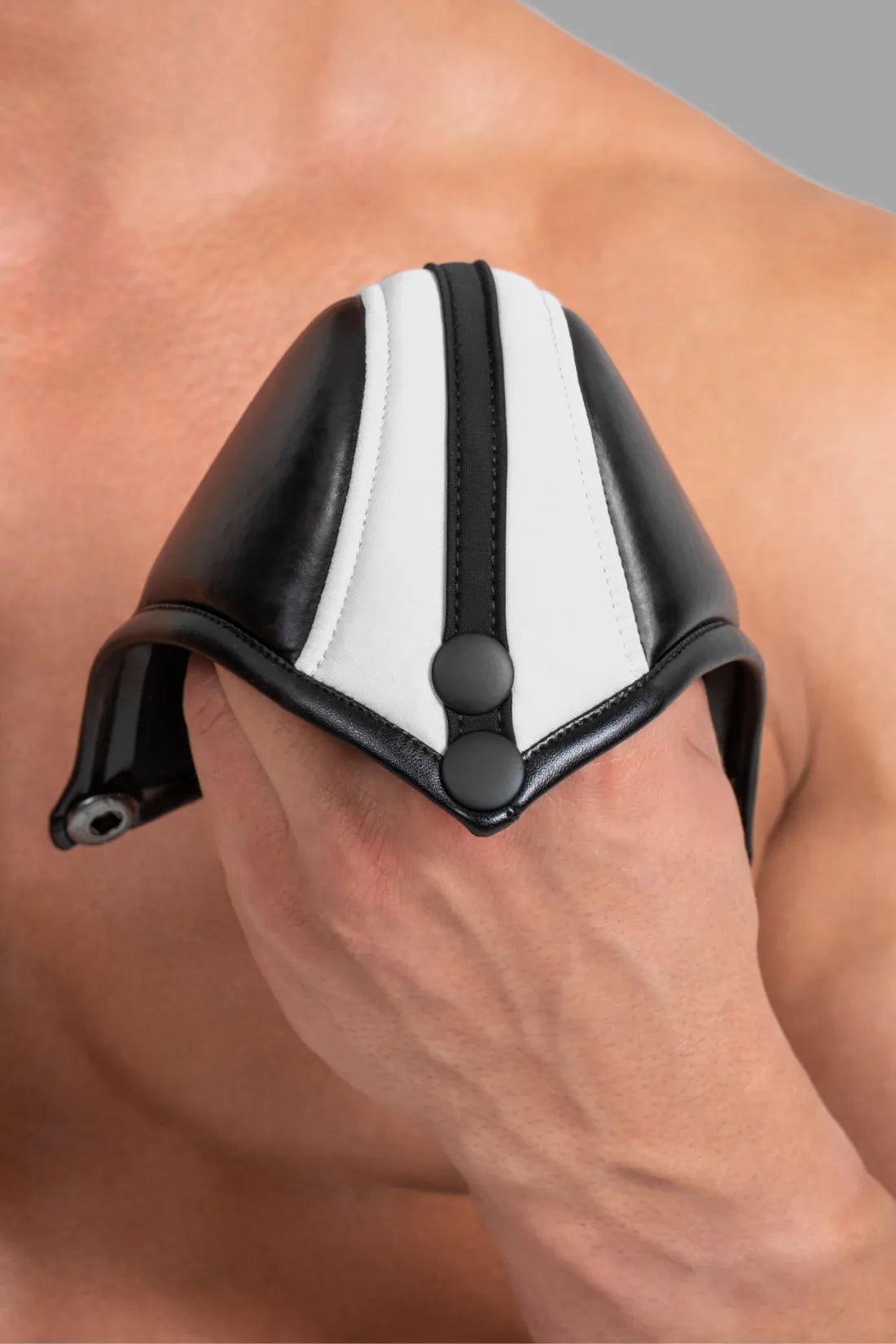 Black and white briefs with pads from Maskulo, comfortable apparel accessory for men, enhancing look and shape.