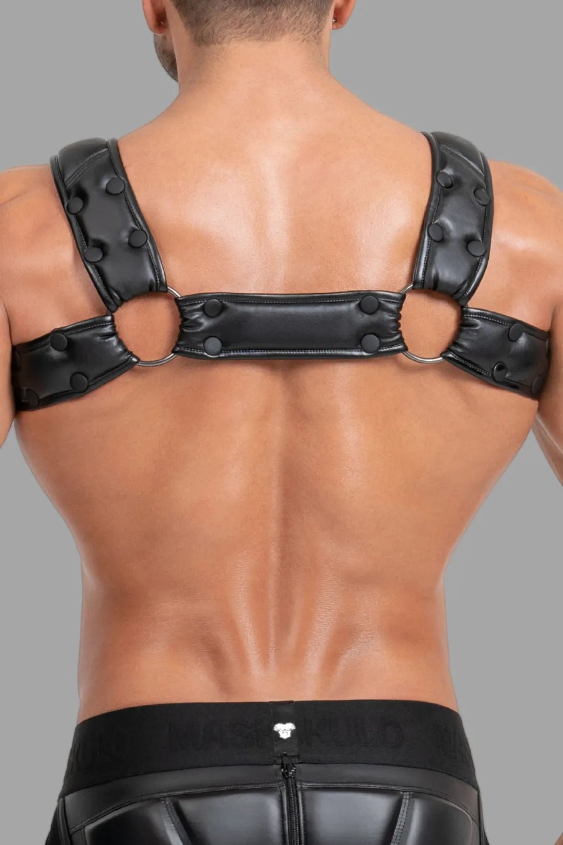 Maskulo Black Body Harness with Push-up Effect, adjustable polyester/polyurethane blend, featuring PU leather piping and 3D branding.