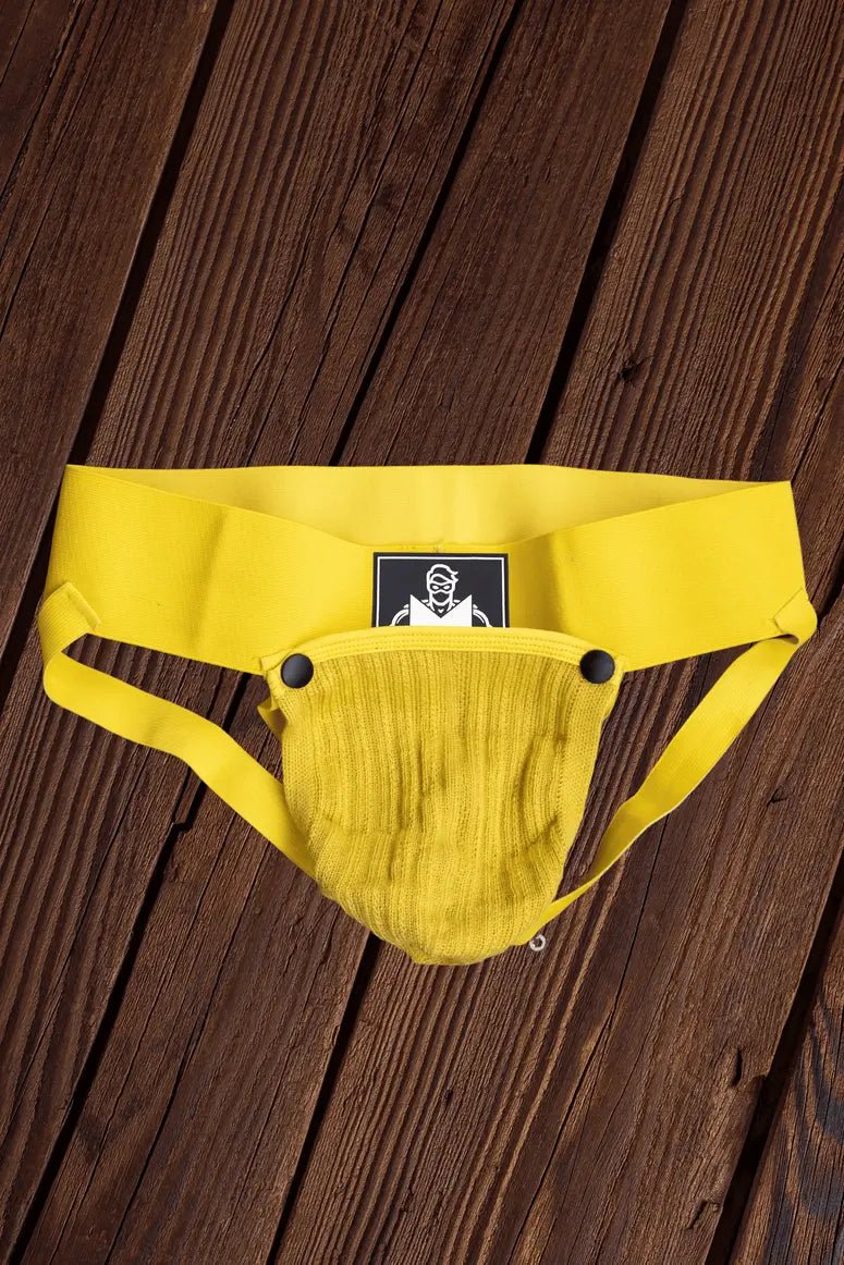 Maskulo Brad Cyclone yellow jockstrap: rough design, soft mesh removable pouch on snap buttons, wide waist band. Underwear.