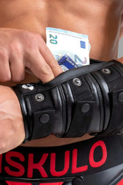 Maskulo wrist wallet with a black rubberized zipper, designed for carrying essentials securely. Stylish and practical accessory.