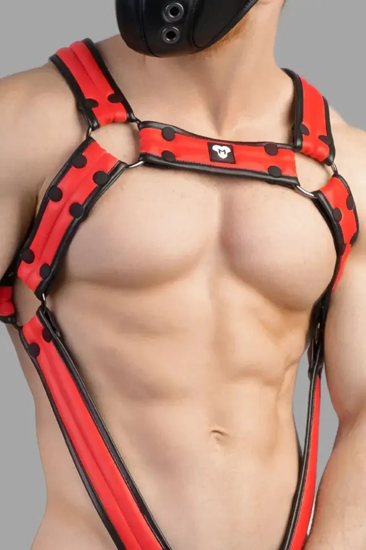 Maskulo Armored Next Body Harness in black and red, featuring a durable polyester/polyurethane blend, bulldog style with removable cockring.
