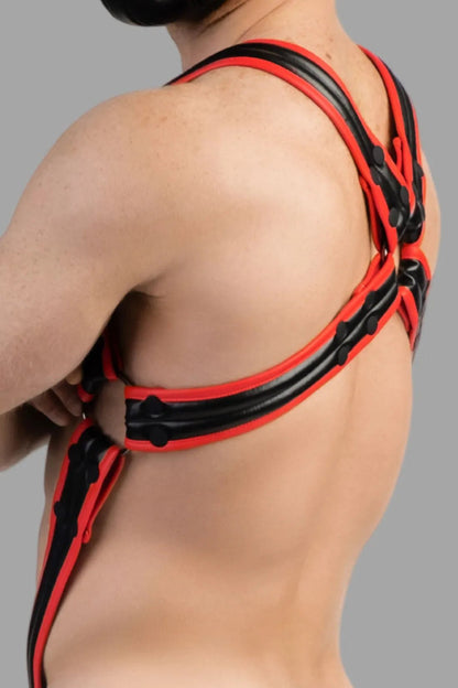 Maskulo Armored Next Body Harness in black and red, featuring a durable polyester/polyurethane blend, bulldog style with adjustable snaps.