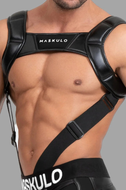 Maskulo Black Body Harness with Push-Up Effect for men, featuring straps and rings. High-quality fetish gear from the EU store.