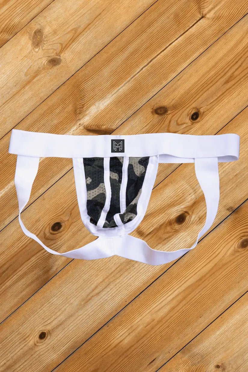 Maskulo Kyle Steelguard Mesh Jockstrap in Camouflage and White. Soft, silky, breathable mesh with a silicone &quot;cuirass&quot; symbol. Polyester/Elastane blend.