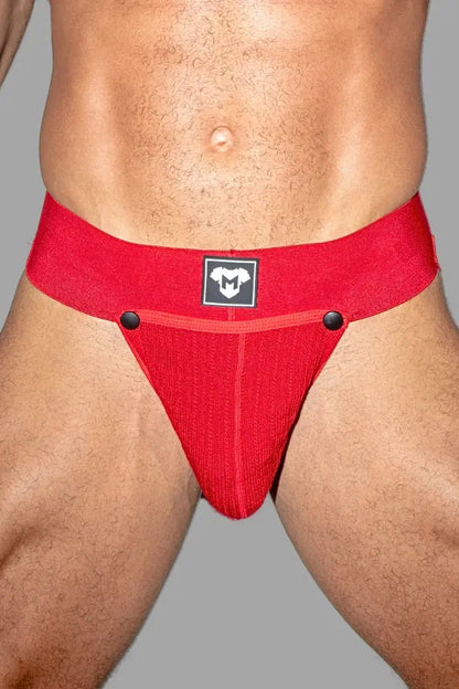 Red Dash Cyclone jockstrap by Maskulo with a removable mesh pouch and wide 7.5 cm waistband. Rough design, made from polyester, cotton, and spandex.