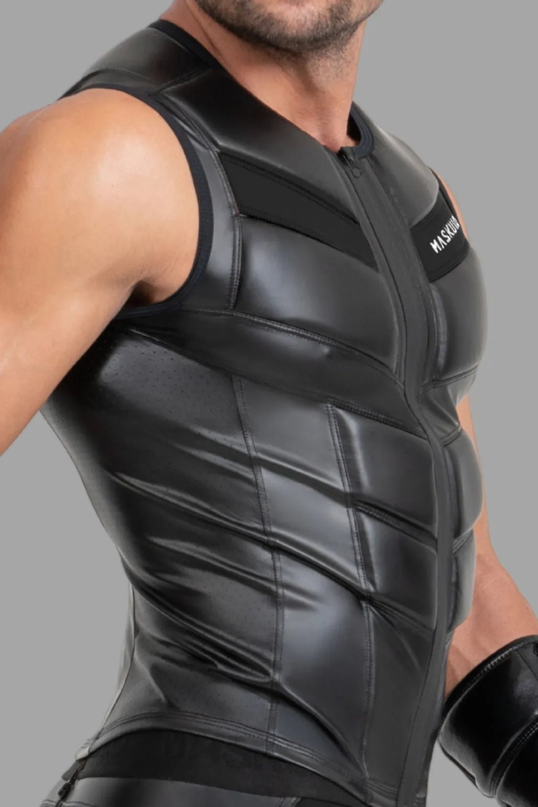 Black zippered vest by Maskulo, a stylish and practical accessory for everyday wear or active use, offering comfort and modern design.