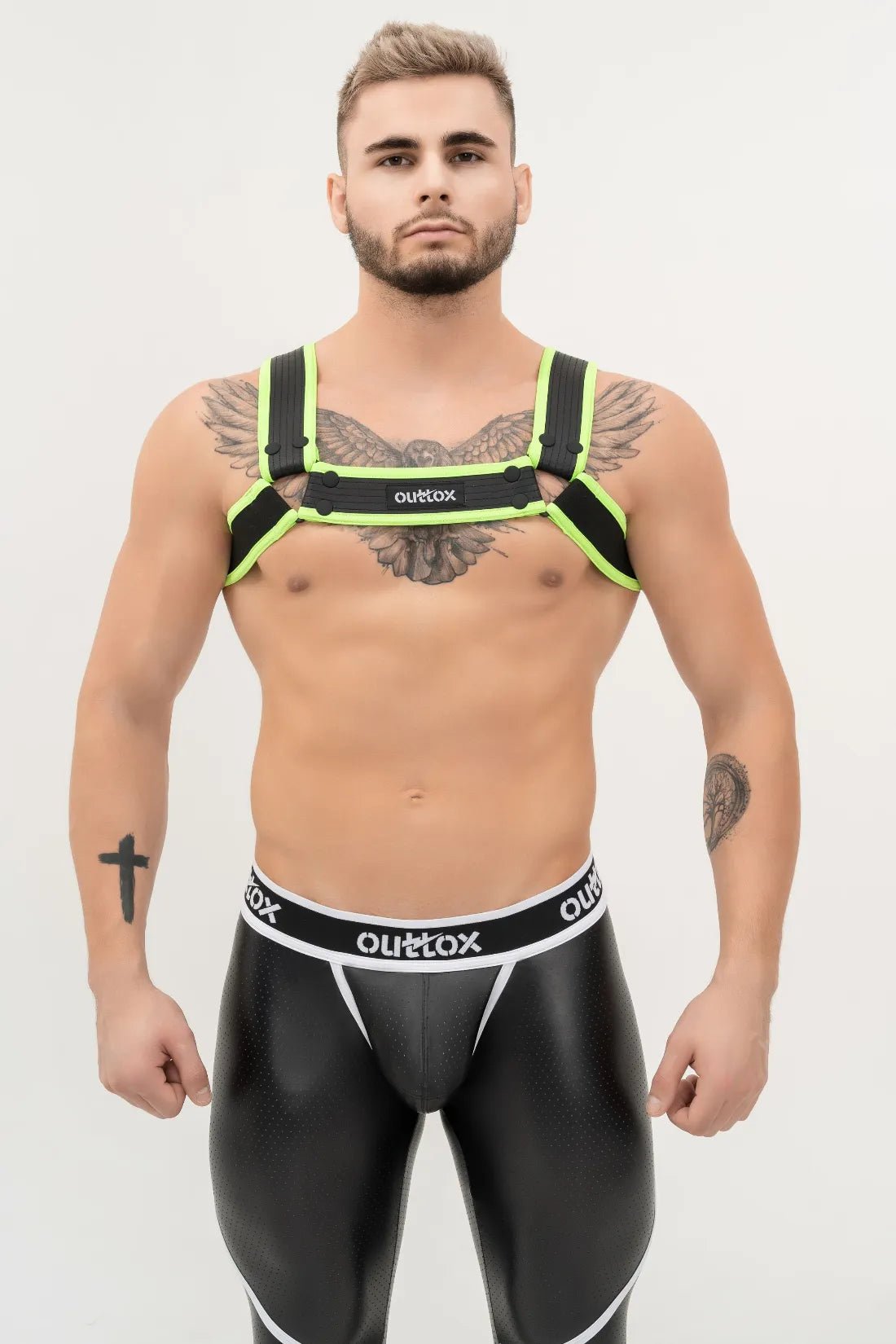 Black and neon green Outtox Bulldog Harness with snaps from Maskulo Global (EU) Store. An eye-catching accessory for adults.