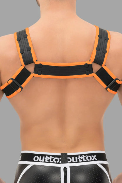 Outtox Body Harness with Snaps in Black and Orange. Leather-look adjustable accessory from Maskulo for a striking look.