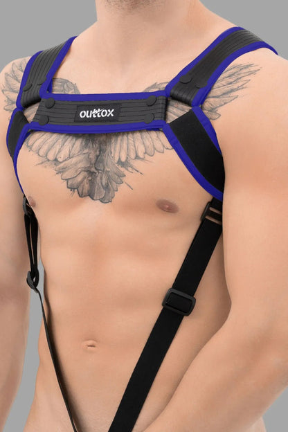 Outtox Body Harness, black and blue, with snaps. Polyester/polyurethane/elastane blend. Comfortable fit and cockring push-up effect.