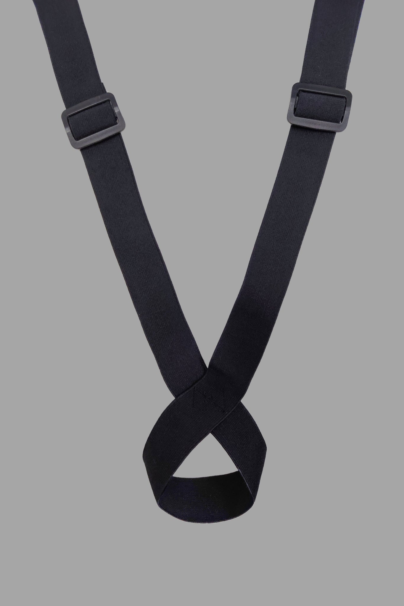 Black and white Outtox body harness with snaps, sold by Maskulo Global (EU) online store. Stylish and descriptive product image.