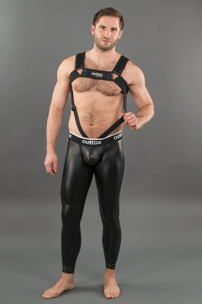 Outtox by Maskulo black body harness with snaps for men. Features adjustable fit, polyester/elastane blend, and cockring design for athletic style.