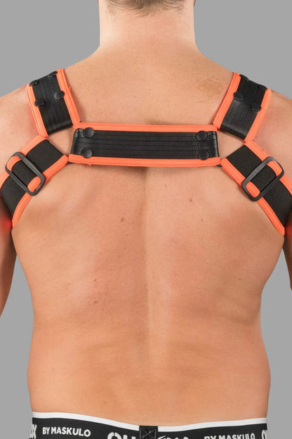 Outtox by Maskulo Bulldog Harness with Snaps in Black and Orange. An edgy accessory for men, available at Maskulo Global (EU) online Store.