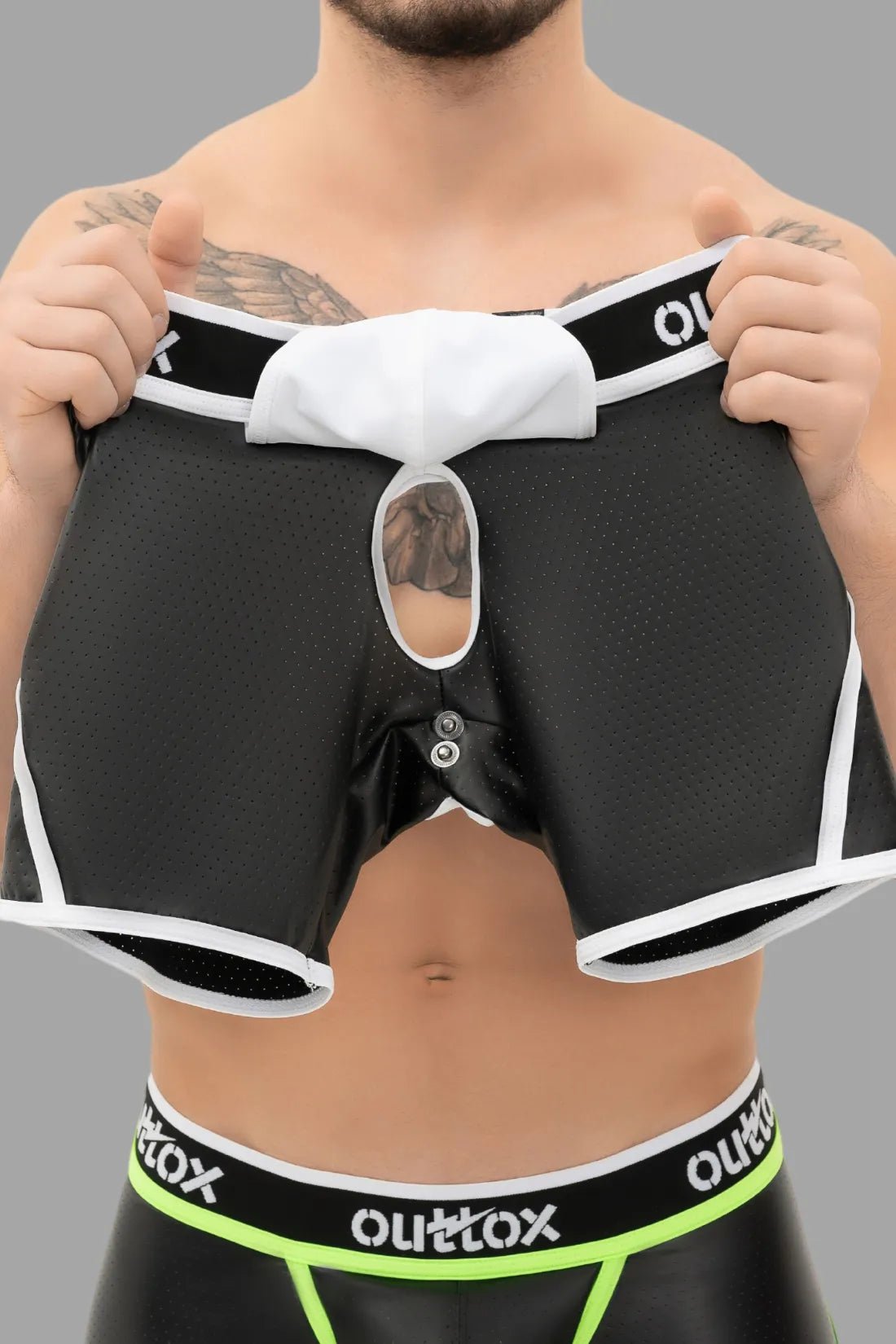 Outtox Open Rear Shorts with Snap Codpiece in Black and White by Maskulo, leather-look with snaps. Perfect for bold wear.